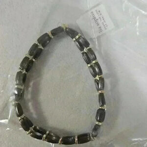 Gunmetal and gold tone elastic bracelet!